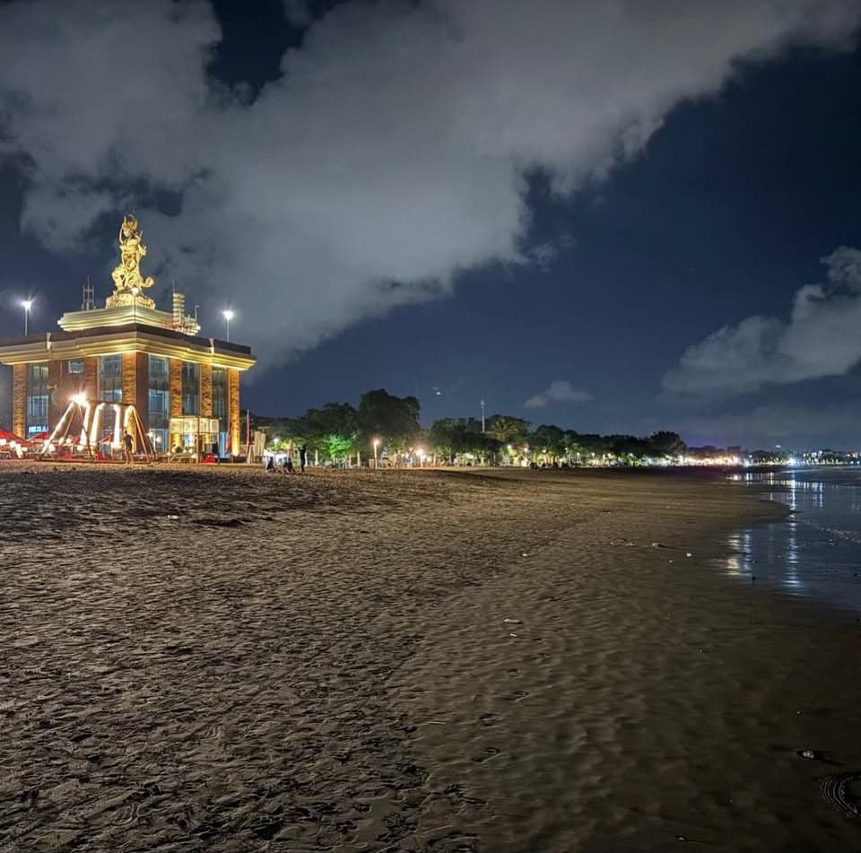 Bali beachfront landmark illuminated at night
