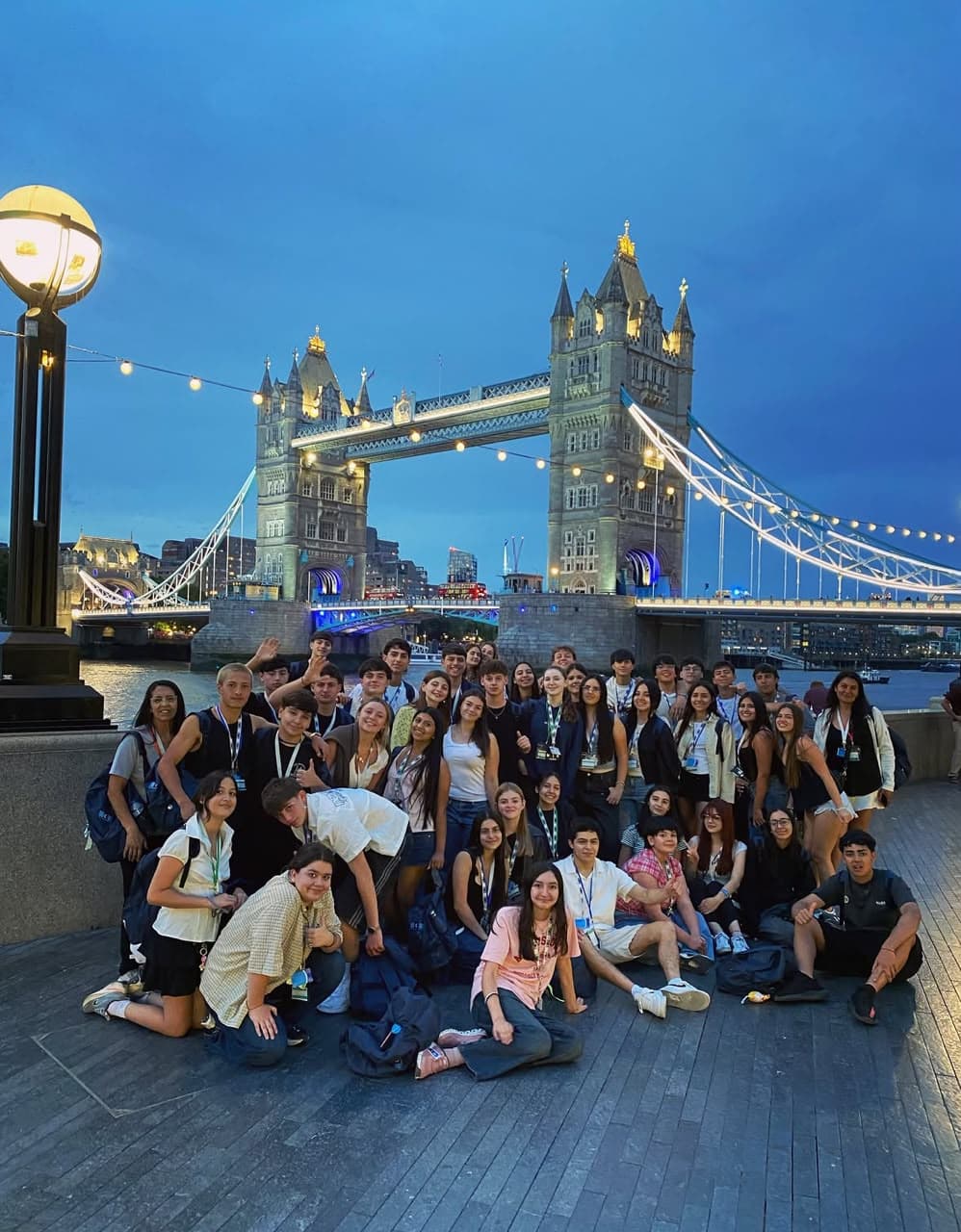 Travel group beside Tower Bridge