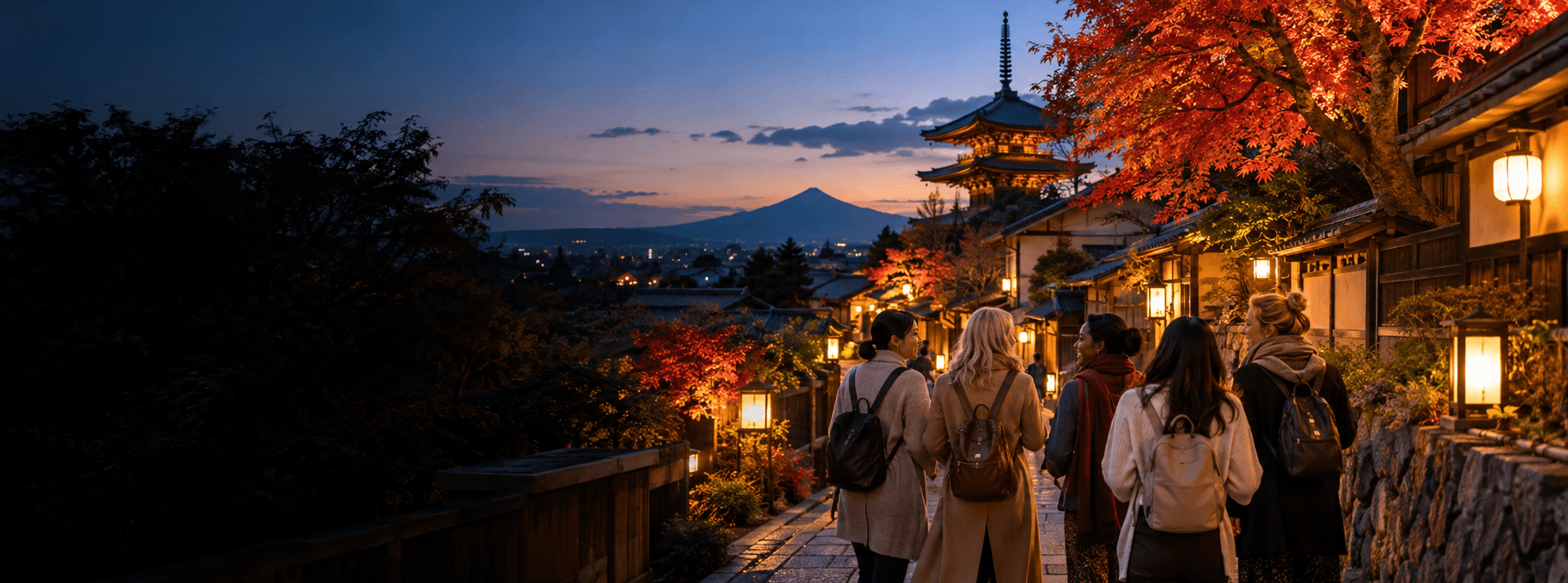 Women travelers enjoying a lantern-lit autumn evening in Kyoto, Japan